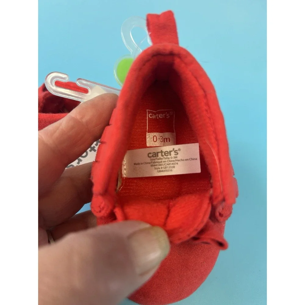 NEW Carters 0-3 mos red moccasins with fringe.